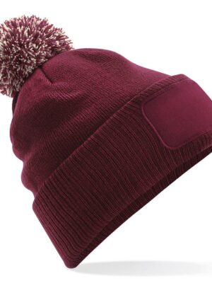 B443 - Bonnet à pompon patch Snowstar®