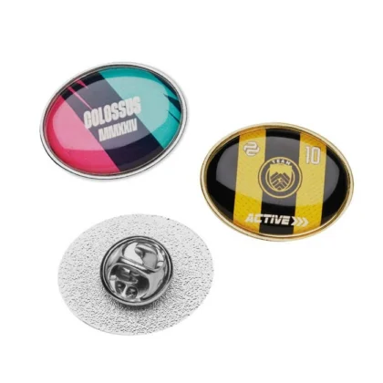 MPIN10 - Pins oval en métal avec doming